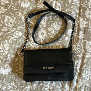 Small Steve Madden crossbody purse. Black with silver.